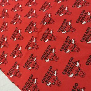 Red cotton poplin fabric with black and white Chicago Bulls logo  (end of roll)